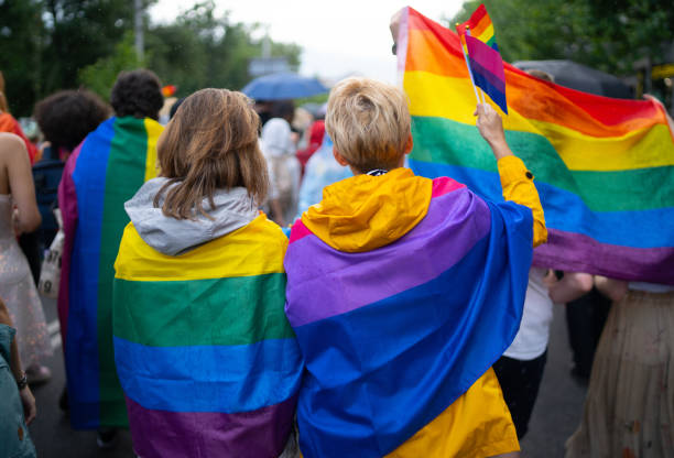 istock LGBT women wearing flags during pride event 1779228915