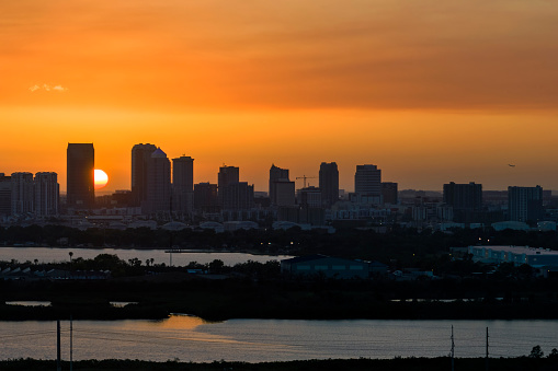This is a photograph of the morning sunrise between the buildings on Sunny Isles Beach in Miami Dade County, Florida.