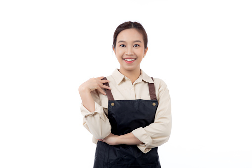 Portrait young asian barista woman wearing apron smile and excited with surprise isolated white background, waitress or entrepreneur cheerful, small business or startup, waiter of cafe or coffee shop.