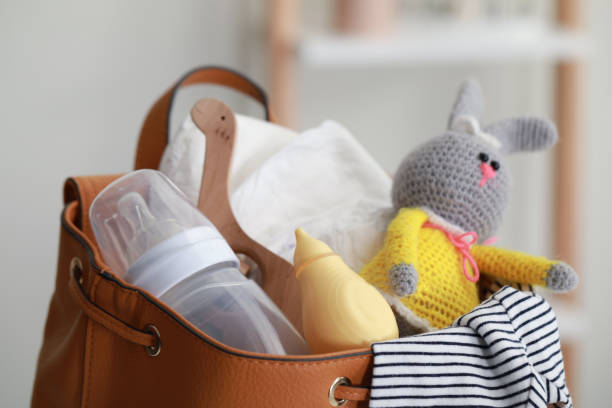 istock Mother's bag with baby's stuff indoors, closeup 1779264376