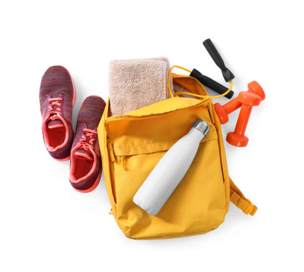 istock Backpack with sports equipment on white background, top view 1779267772