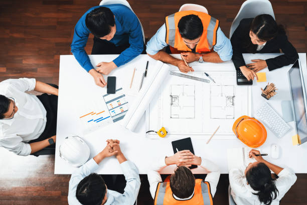 istock Diverse group of civil engineer and client working on architect. Prudent 1779280136