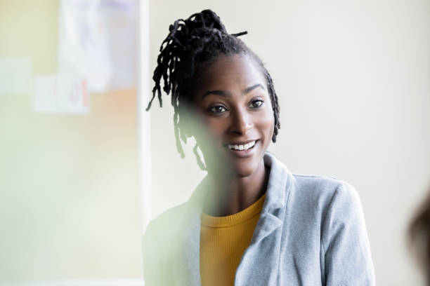 istock A female educator leads a group dialogue with her high school pupils. 1779306516
