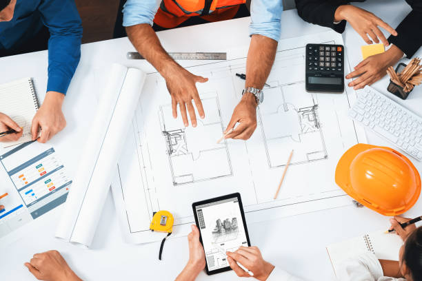 istock Diverse group of civil engineer and client working on architect. Prudent 1779308887