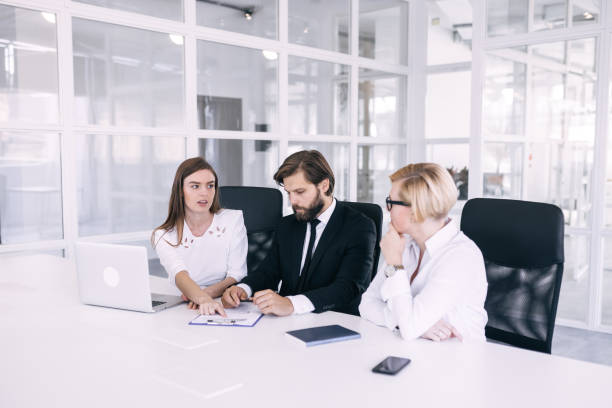 istock A group of young office workers dressed in business suits doing 1779311851