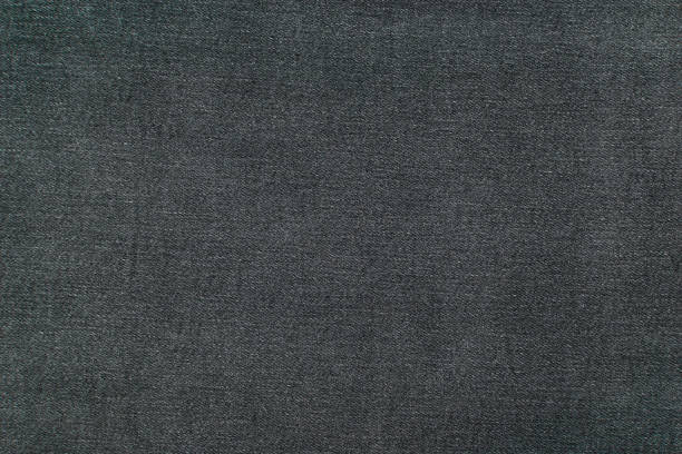 istock The background is made of black denim material. 1779318132