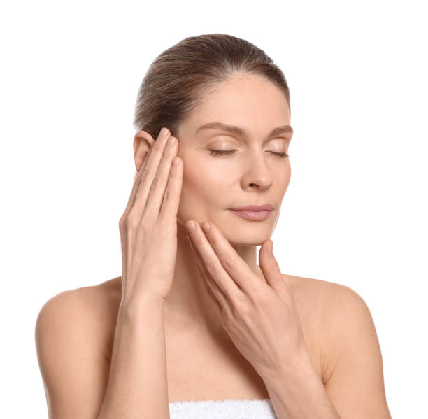 istock Woman massaging her face on white background 1779329291