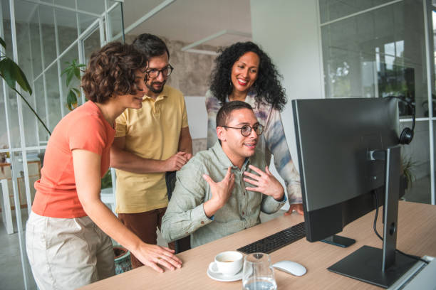 istock Diverse Team Empowers Hispanic Male Call Center Employee to Secure a Client 1779330351
