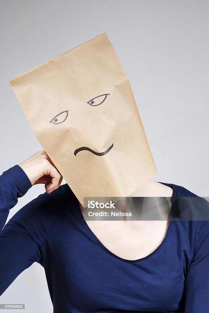 bored person a person symbolizing boredom with a paper bag face Adult Stock Photo