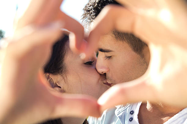 Happy young couple having fun in a park