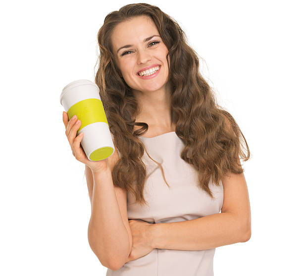 istock Smiling young woman holding coffee cup 177936894