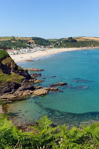 Pentewan beach and coast Cornwall between Mevagissey and Porthpean England UK on a beautiful blue sky summer day