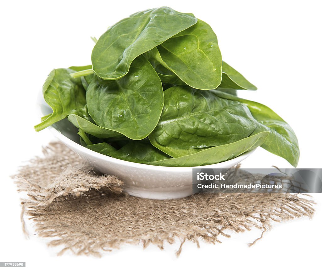 Portion of Spinach on white Portion of Spinach isolated on white background Agriculture Stock Photo