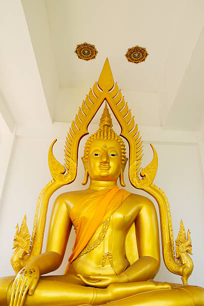 gold Buddha statue,Puket,Thai PHUKET- MARCH 16. Buddha statue in the Wat Chalong temple on March 16, 2013 in Phuket, Thailand. Wat Chalong is history Religion and Famous for tourism puket stock pictures, royalty-free photos & images