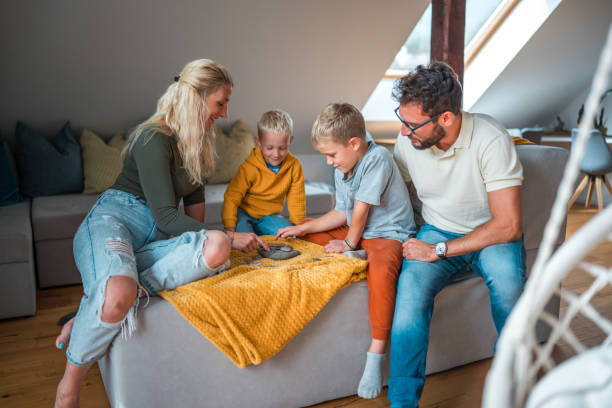 istock Tic Tac Toe Game on Sofa with Two Boys 1779448469