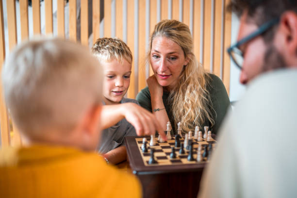 istock Chess Playtime at Home with Two Brothers 1779448662