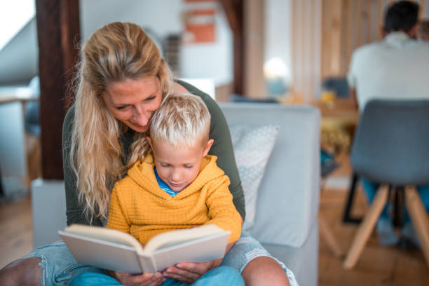 istock Mother and Son Relaxing with a Book 1779449051