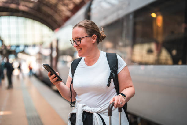 istock Caucasian Female at Copenhagen Train Station Using Smartphone 1779456588