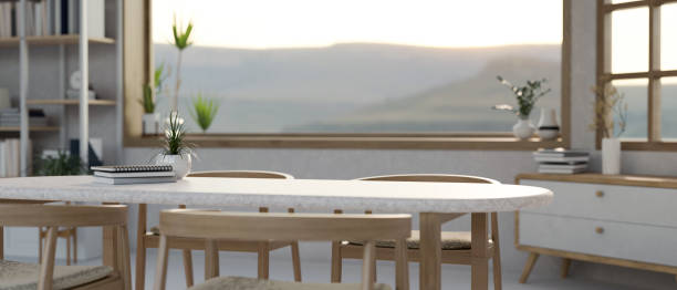 istock Empty space on a minimalist dining table in a beautiful Scandinavian dining room. 1779478397