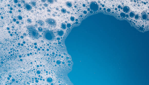 istock Detergent foam bubble on wate. Blue background, Soap sud 1779510960