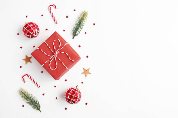istock Christmas gift with decorations on white background 1779542362