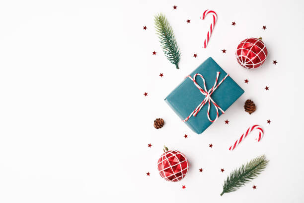 istock Christmas gift with decorations on white background 1779569177