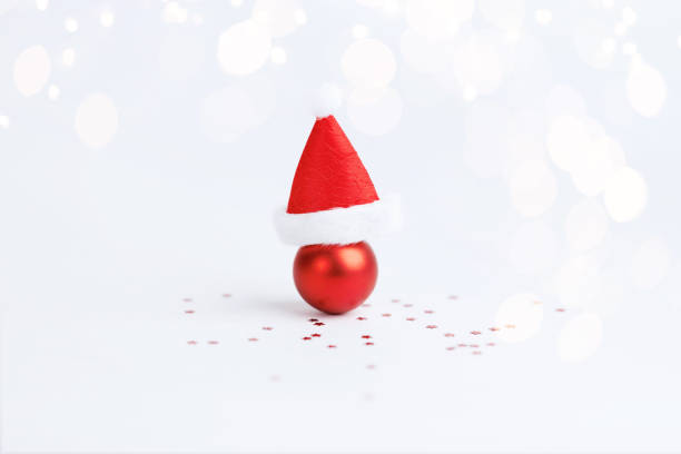 istock Christmas ball with Christmas hat on white background 1779577894
