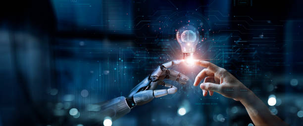 istock AI, Machine learning, Hands of robot and human touch on big data network, Brain data creative in light bulb, Science and artificial intelligence technology, innovation for futuristic. 1779586389