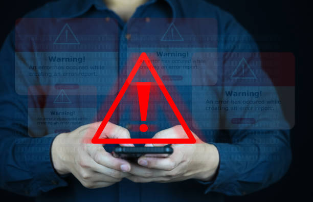 istock Emergency warning alert alarm on Smartphone, Data network protection, Virus alarm with people using application on smartphone. 1779596818