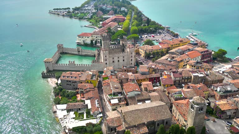 Aerial view of Sirmione on Lake Garda in Northern Italy, aerial view of the shoreline of Lake Garda, the largest Lake Garda in Italy, aerial view of  Sirmione town on Lake Garda in Italy, Aerial view Sirmione town