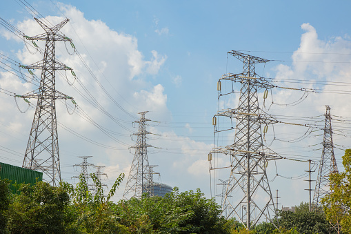 High voltage electric tower line pylon for distribution of electricity from powerstations to customers through national power grid