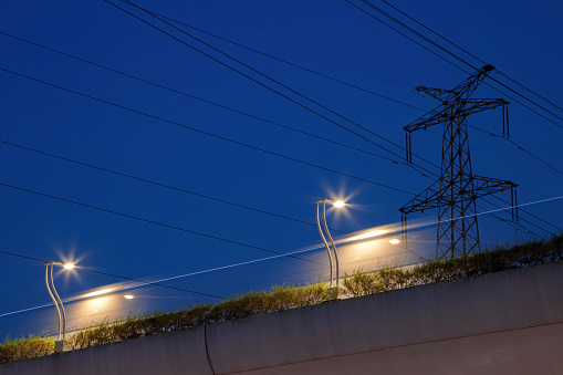 High voltage electric tower line pylon for distribution of electricity from powerstations to customers through national power grid