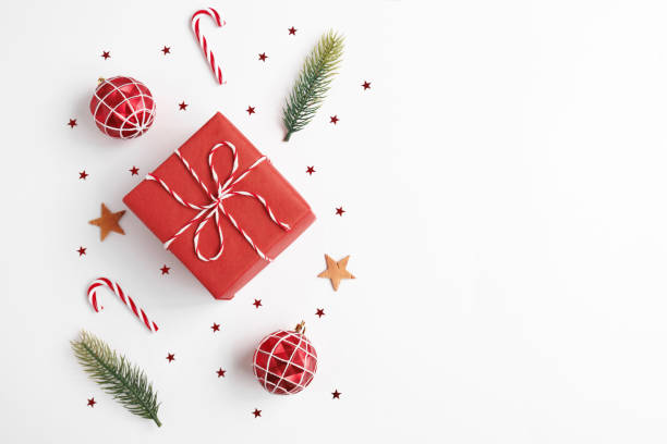 istock Christmas gift with decorations on white background 1779626674