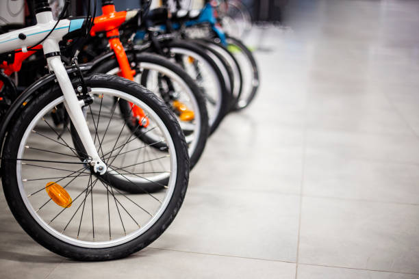 istock Close up of bicycles in a row in a bicycle store. Selective focus. 1779640133