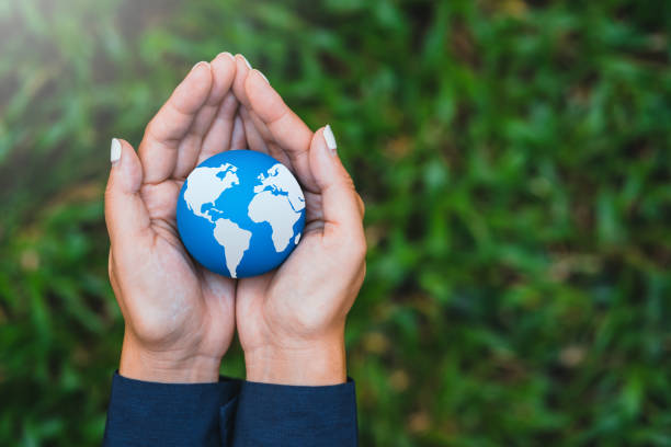 istock Environment Earth Day hands holding earth  environmentally sustainable Save Earth.  the Environment World Earth Day concept 1779640676
