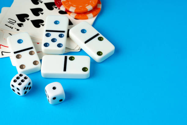 istock Playing cards, chips and dice on blue backgorund 1779653427