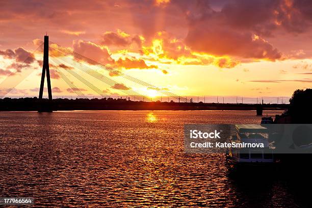 Sunset On The Town River In Riga Stock Photo - Download Image Now - Architecture, Baltic Countries, Bridge - Built Structure