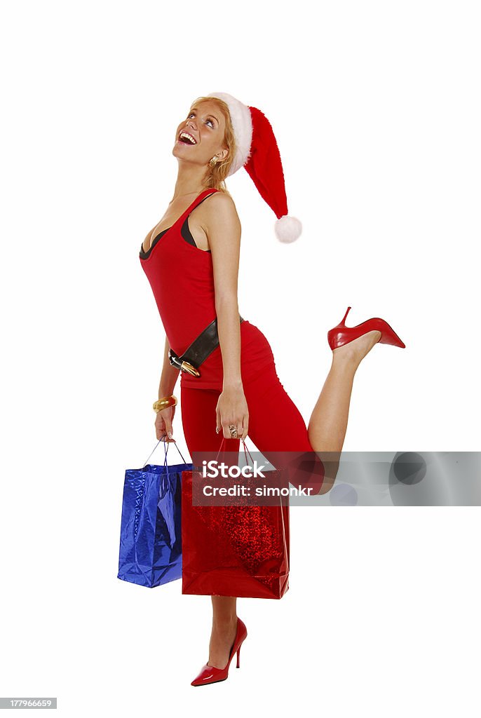 サンタ女性のショッピング - 1人のロイヤリティフリーストックフォト