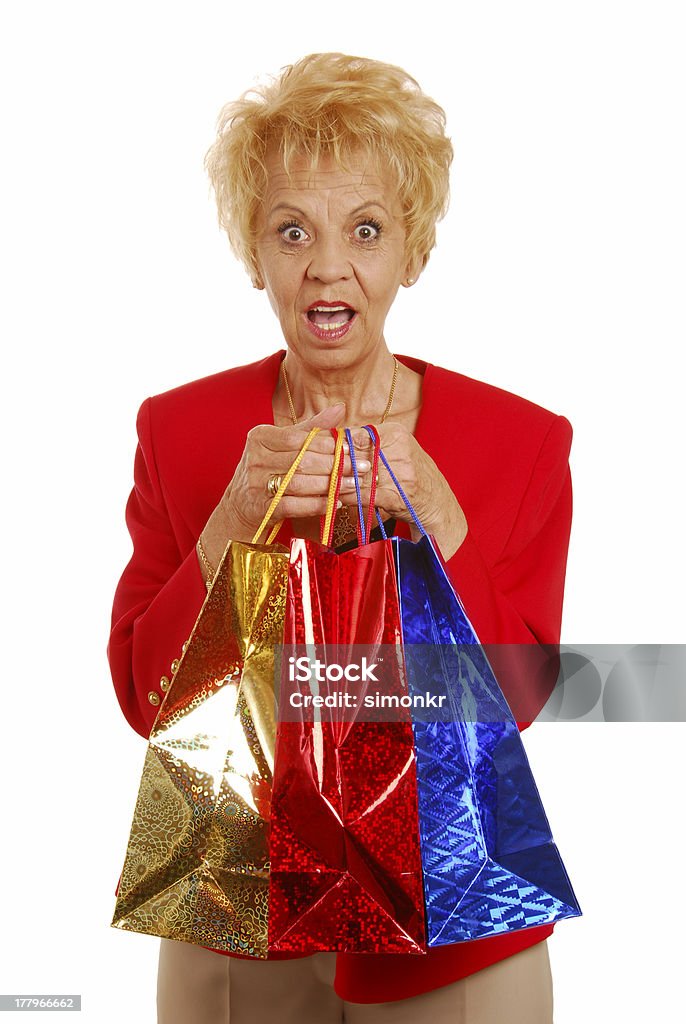 Fancy sorprendente nonna con regali - Foto stock royalty-free di 60-64 anni