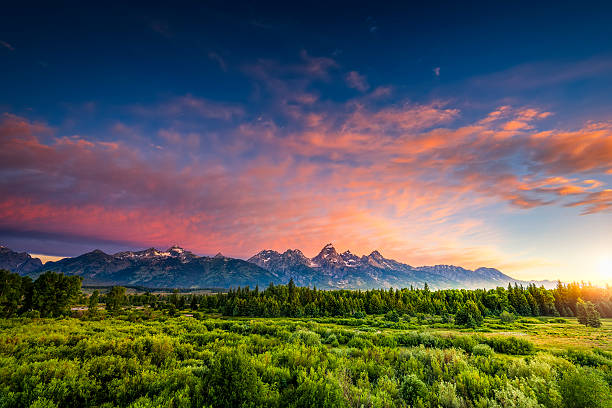 Sunrise in the Wyoming Tetons Colorful sunrise at Blacktail Ponds Overlook in the Tetons teton range photos stock pictures, royalty-free photos & images