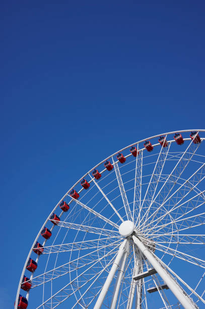 istock New ferris wheel and deep blue sky 1779676079