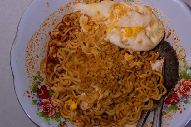 istock instant noodles cooked with the addition of eggs 1779706479