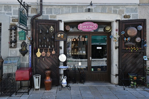 Agnone, Italy – August 14, 2023: The door of a craft shop in a town in the province of Isernia.