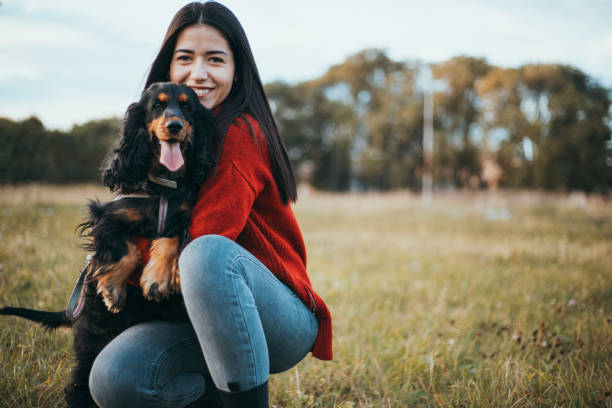 istock Young woman with dog 1779735442