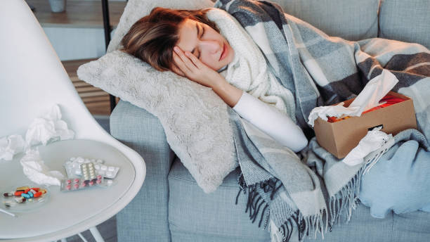 istock Fever headache sick napping high temperature woman 1779735619