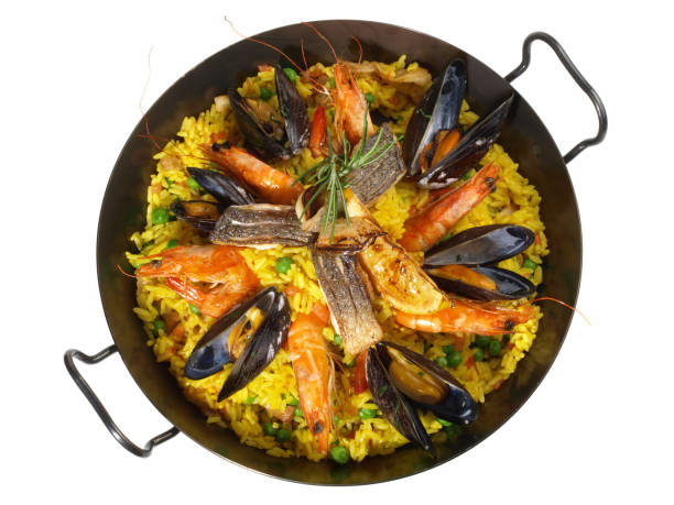 istock Paella in a Pan isolated on white Background 1779736140