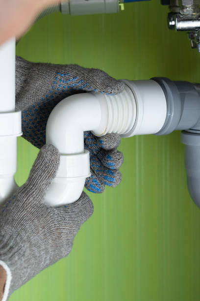 istock Repairing a drain pipe in the kitchen under the sink. 1779736150
