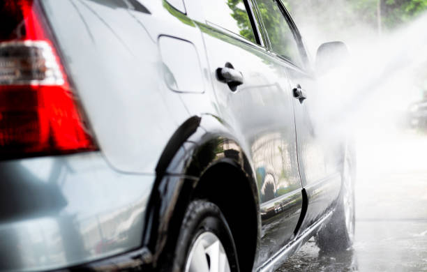istock Washing car with flowing water and foam 1779740048