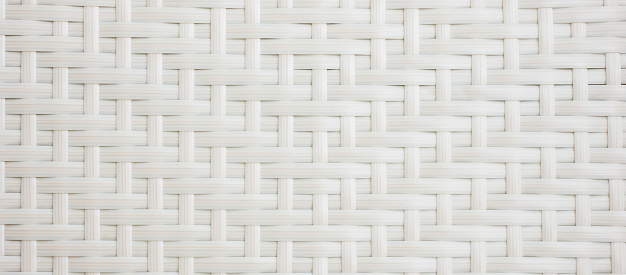 White chair with basket weave pattern