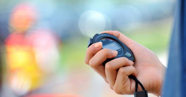 istock Hand holding the running stopwatch 1779742906
